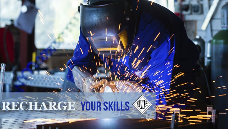 Welder using a welder with "Recharge your skills" written below